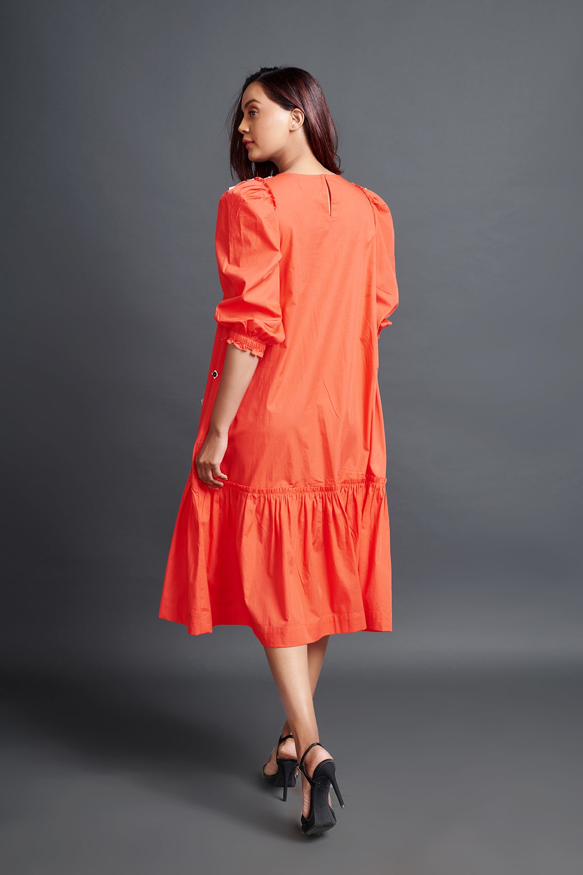 Image of ORANGE GATHERED HEM DRESS IN COTTON BASE WITH CUTWORK EMBROIDERY. From savoirfashions.com