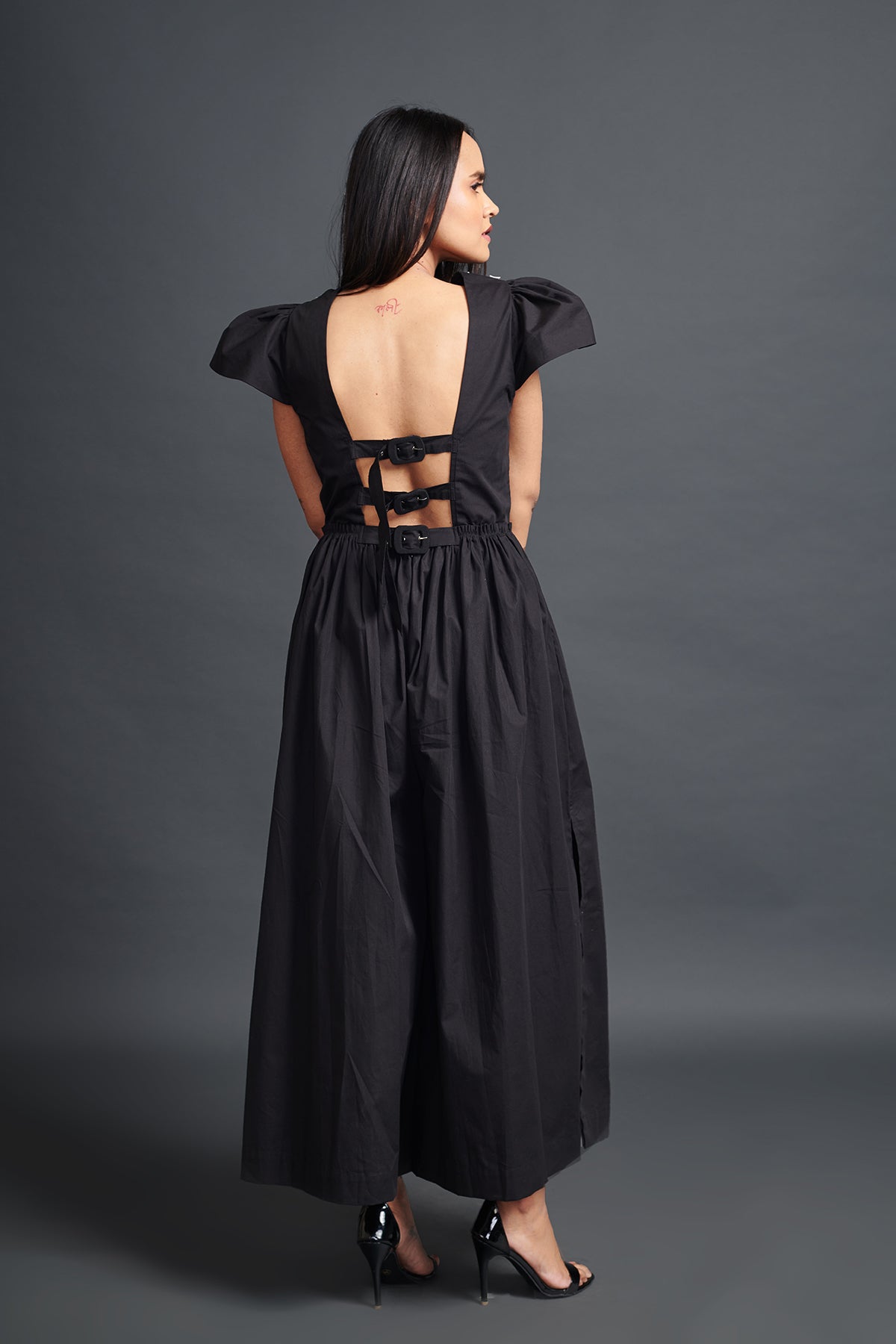 Image of BLACK BACKLESS JUMPSUIT IN COTTON BASE WITH CUTWORK EMBROIDERY. From savoirfashions.com