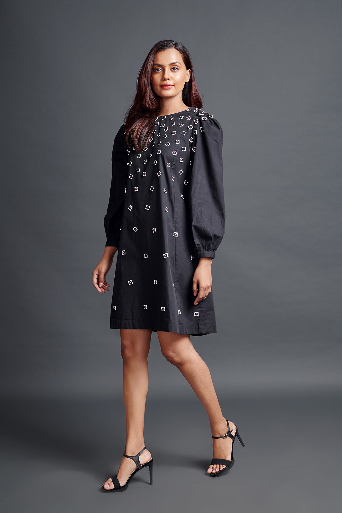 Image of BLACK GATHERED HEM DRESS IN COTTON BASE WITH CUTWORK EMBROIDERY. From savoirfashions.com