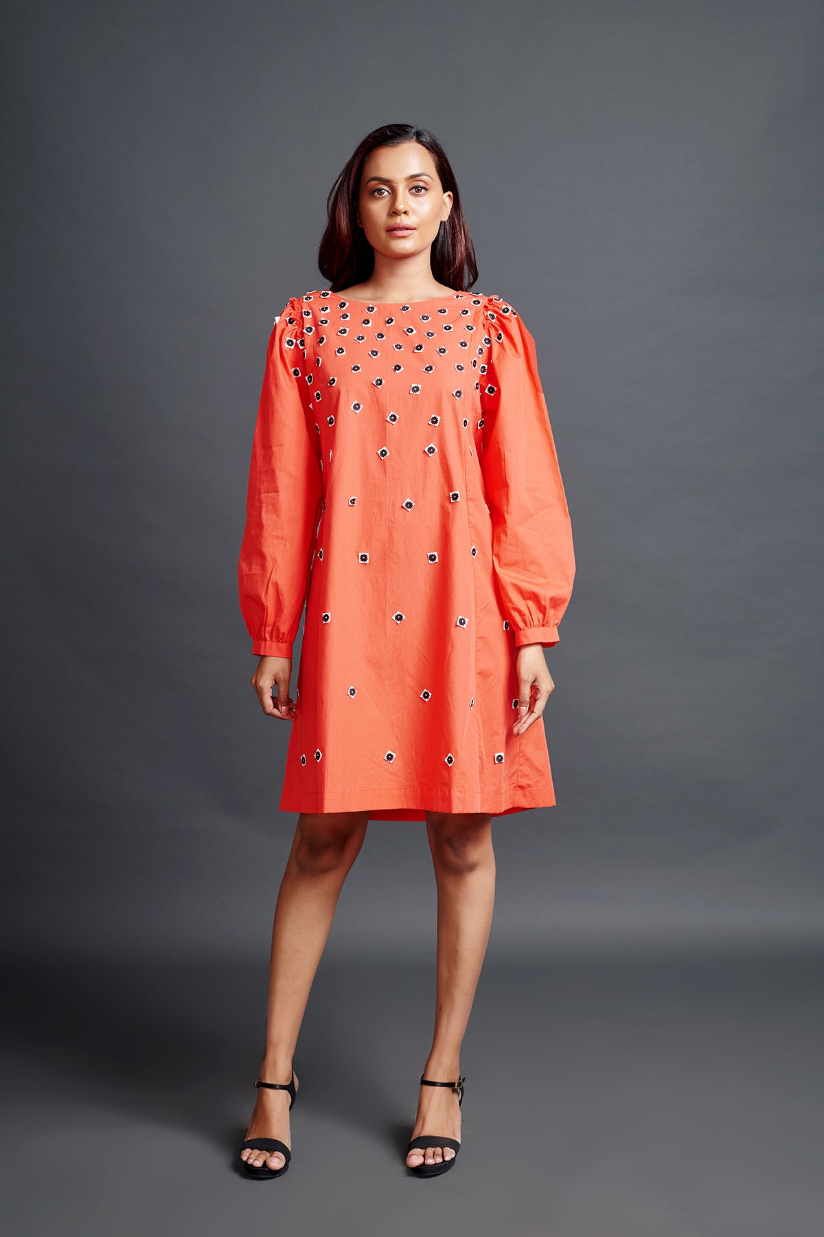 Image of ORANGE A-LINE DRESS IN COTTON BASE WITH EMBROIDERY AND BACK KNOT DETAIL. From savoirfashions.com