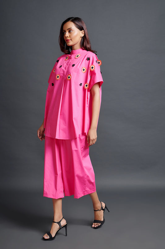Image of PINK OVERSIZED SHIRT IN COTTON BASE WITH CUTWORK EMBROIDERY. IT IS PAIRED WITH MATCHING PANTS. From savoirfashions.com