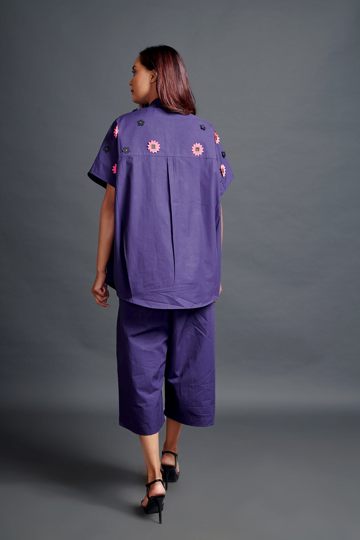 Image of PURPLE OVERSIZED SHIRT IN COTTON BASE WITH CUTWORK EMBROIDERY. IT IS PAIRED WITH MATCHING PANTS. From savoirfashions.com