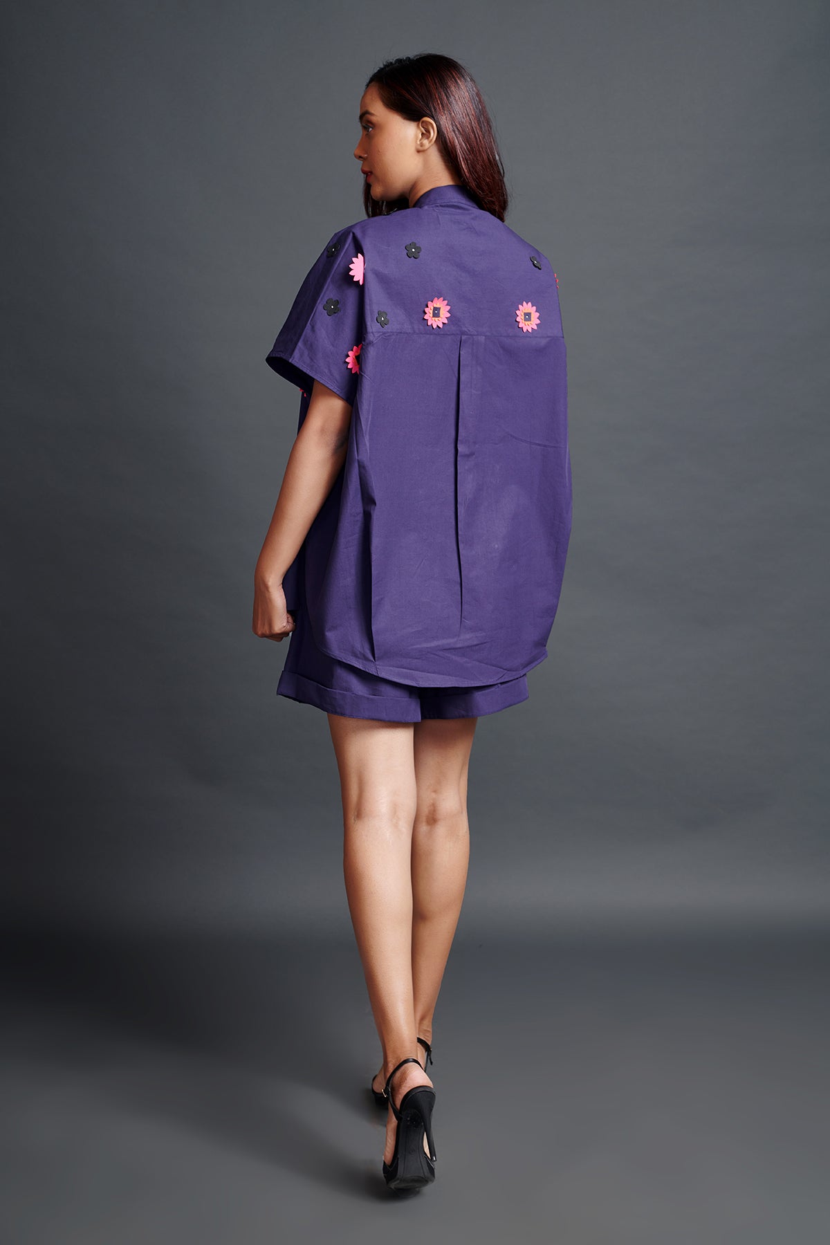 Image of PURPLE OVERSIZED SHIRT IN COTTON BASE WITH CUTWORK EMBROIDERY. IT IS PAIRED WITH MATCHING SHORTS. From savoirfashions.com