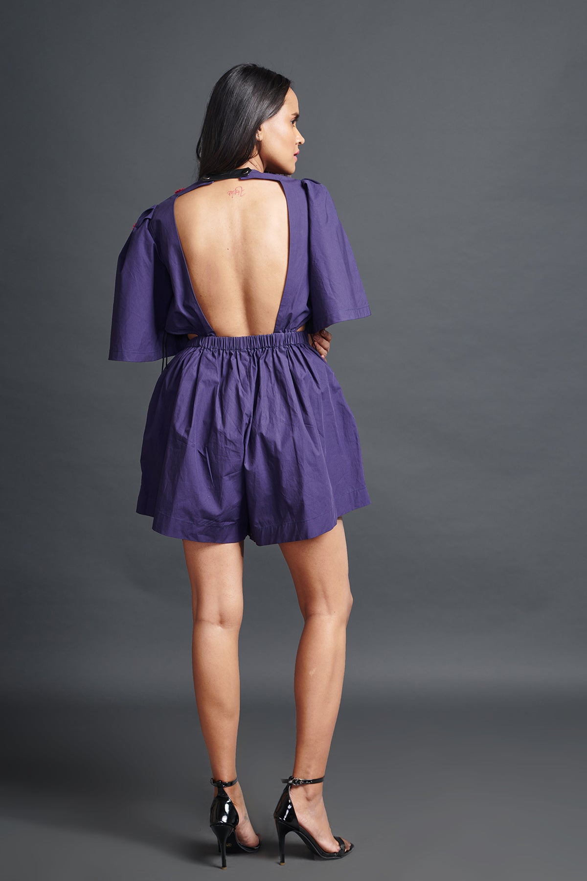Image of PURPLE PLAYSUIT IN COTTON BASE WITH CUTWORK EMBROIDERY AND BACKLESS SIDE CUT-OUT DETAIL. From savoirfashions.com