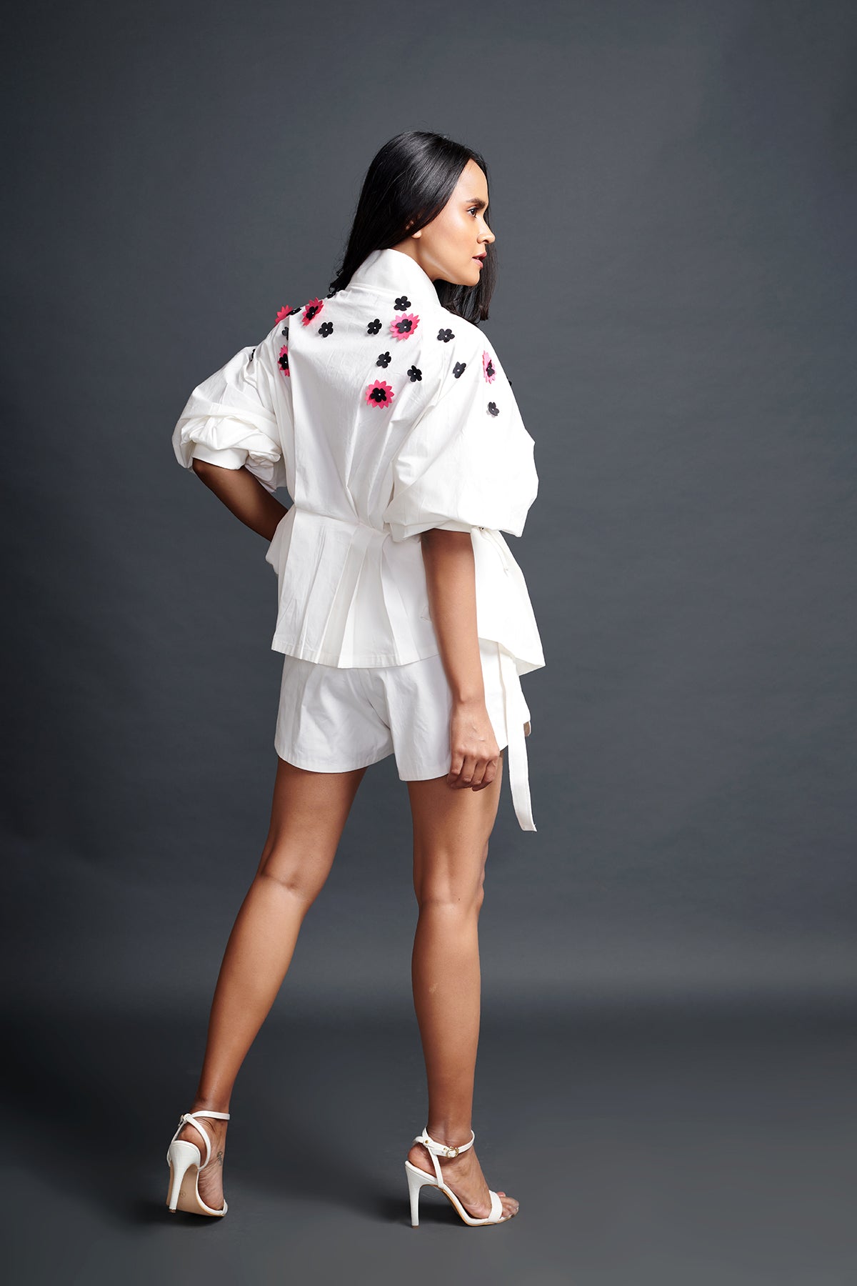 Image of WHITE SHIRT IN COTTON BASE WITH PLEATED CONFETTI DETAIL. IT IS PAIRED WITH MATCHING SHORTS. From savoirfashions.com