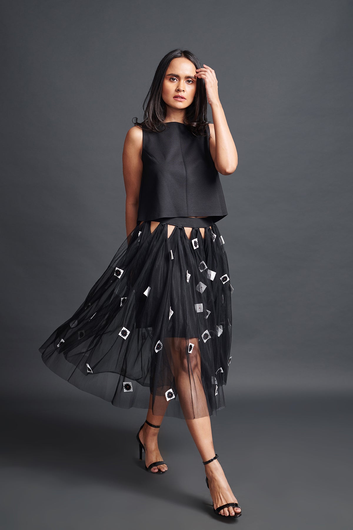 Image of BLACK CONFETTI DETAILED PANELLED NET SKIRT WITH SLEEVELESS CROP TOP.From savoirfashions.com