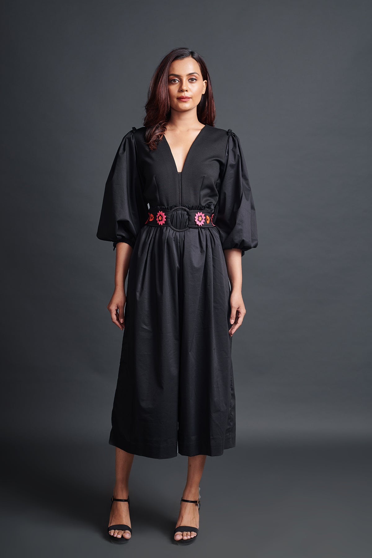 Image of BLACK MONOCROM JUMPSUIT WITH NEOE CONFETTI BELT. From savoirfashions.com