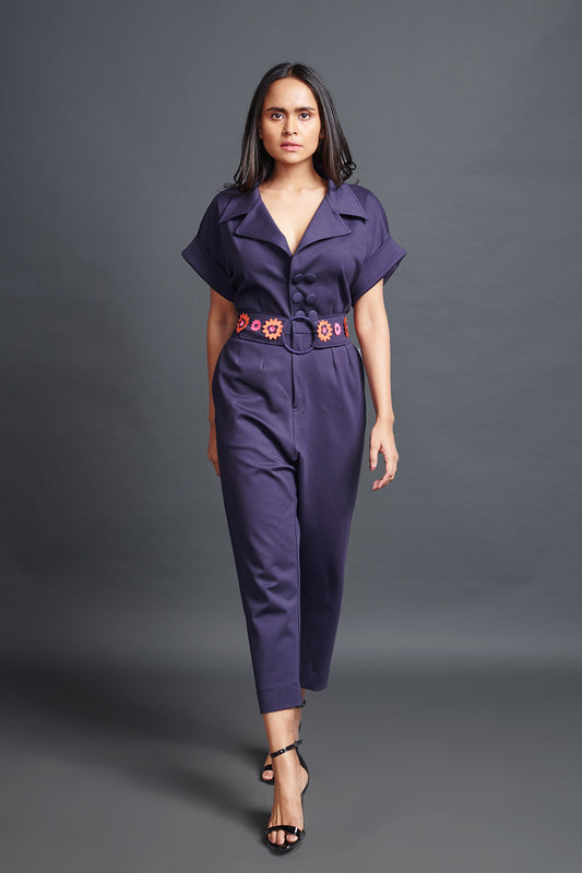 Image of PURPLE COLLARED JUMPSUIT WITH NEION CONFETTI BELT. From savoirfashions.com