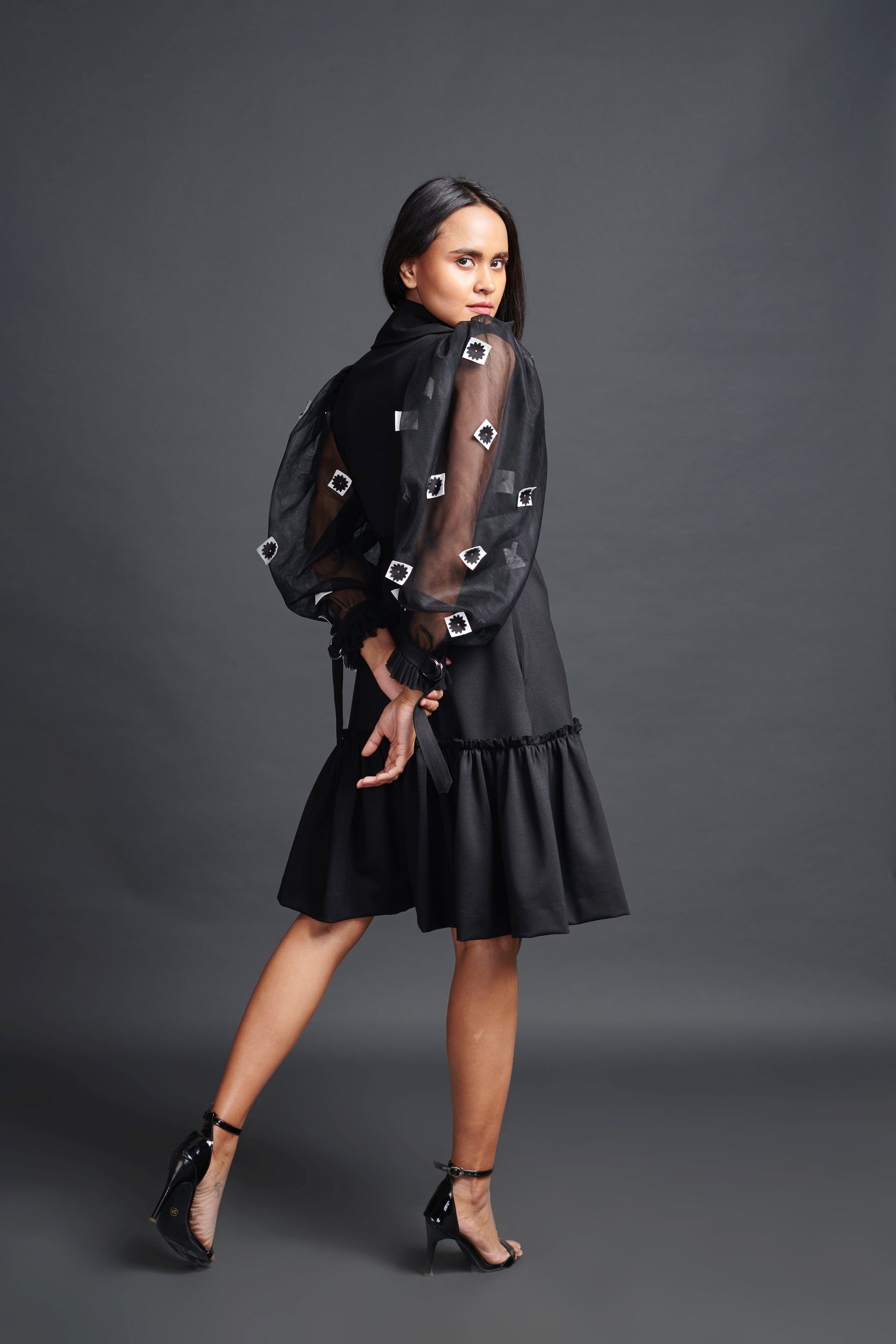 Image of BLACK JACKET DRESS WITH CUTWORK ON PUFFED SLEEVES. From savoirfashions.com