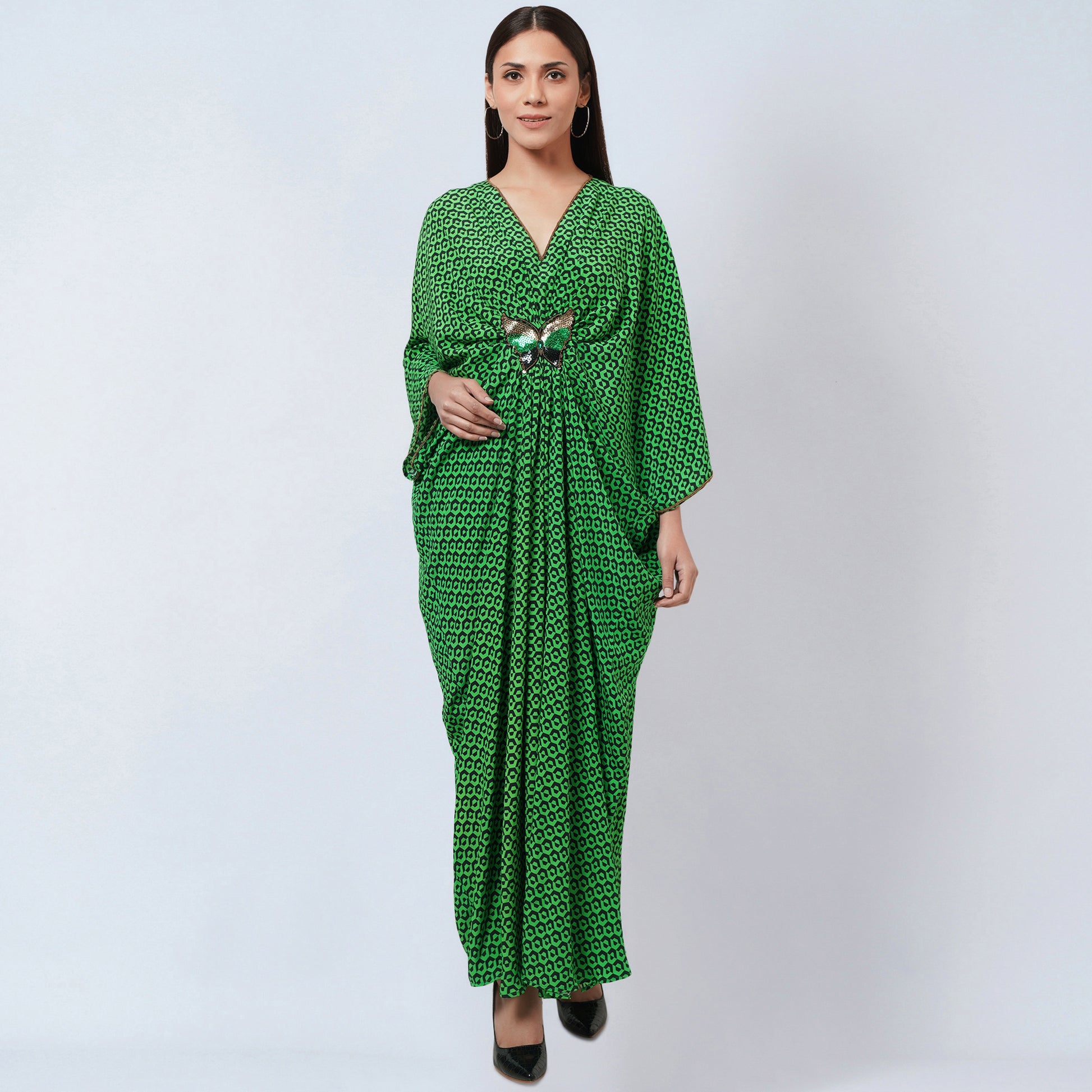 Image of Indulge in luxury with this full-length kaftan made from 100% silk fabric. Featuring a fluorescent green honeycomb print with embroidered butterfly motif, your wardrobe will be enhanced with an elegant, yet stylish element.  From savoirfashions.com