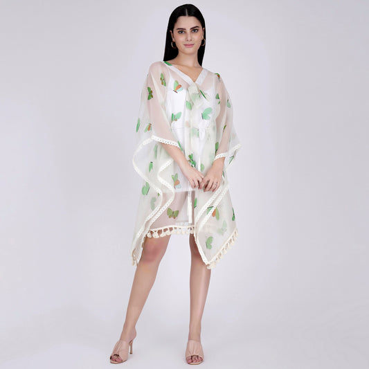 Image of Introducing the NEON GREEN BUTTERFLY MID LENGTH KAFTAN, designed to make a bold statement. Made from high-quality polyester, the kaftan has a lightweight feel that offers exceptional comfort all day long. The vibrant neon green butterfly pattern brings a unique touch to any outfit. The mid-length sleeves create an elegant and sophisticated look. Make a statement with the NEON GREEN BUTTERFLY MID LENGTH KAFTAN.  From savoirfashions.com
