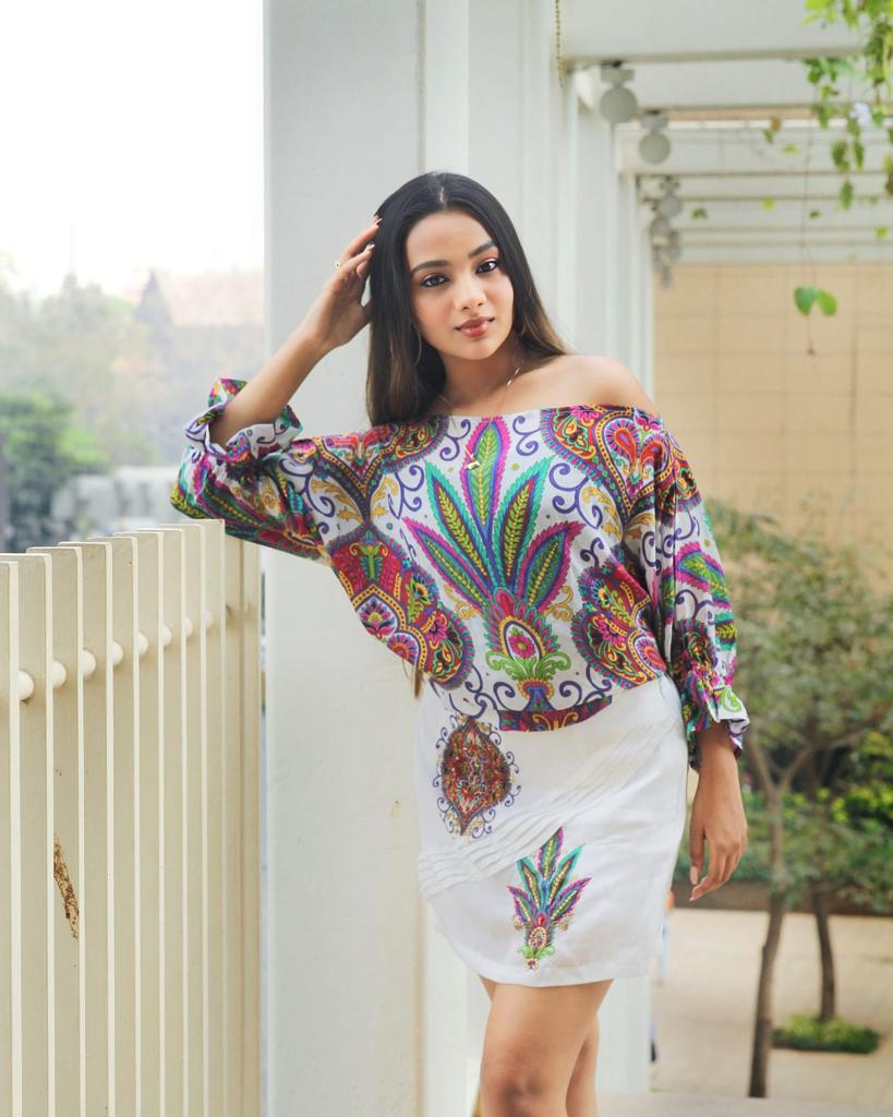 Image of This two-piece coord set features a white base combined with fresh, colorful prints. Crafted from a lightweight and comfortable material, it's perfect for your everyday wardrobe.  From savoirfashions.com