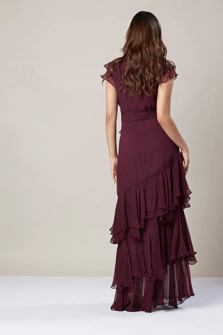Image of The Multi-Layer Ruffle Gown is perfect for special occasions. It features a multi-layered ruffle skirt which adds an elegant touch to the design. The mid-waist style of the gown provides a figure-flattering look. The fine fabric ensures a comfortable and soft-to-touch feel. . From savoirfashions.com