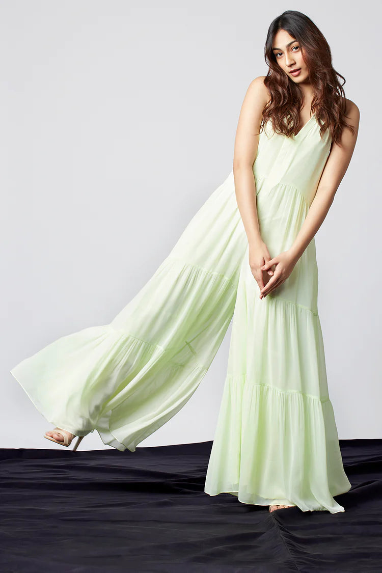 Image of Look effortlessly stylish in this LIGHT MINT sleeveless jumpsuit from the BRUNCH COLLECTION. Crafted from a lightweight and breathable fabric, it offers an effortless fit and feel. Perfect for a day out or running errands, this jumpsuit is designed for complete comfort throughout the day.    From savoirfashions.com
