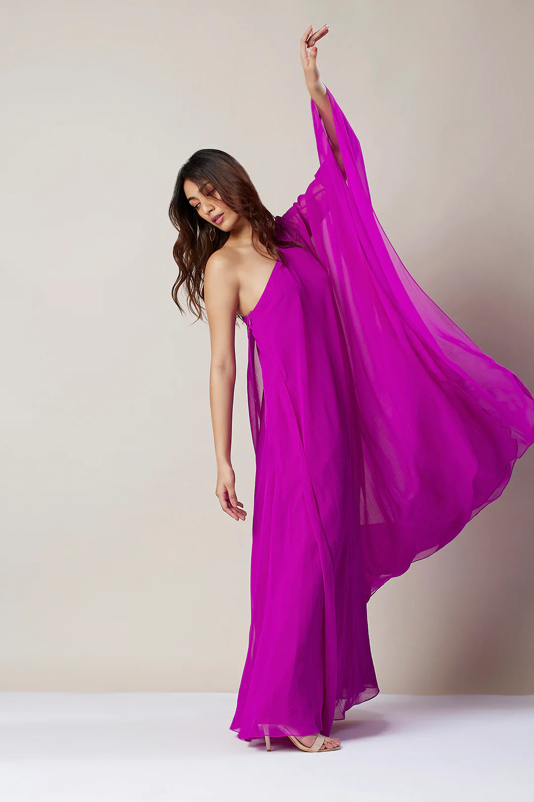 Image of Upgrade your evening wardrobe with the One Shoulder Maxi Dress. Its single-shoulder design is modern yet timeless, while the maxi length gives you enough coverage for any occasion. Perfect for creating a chic and sophisticated look.    From savoirfashions.com