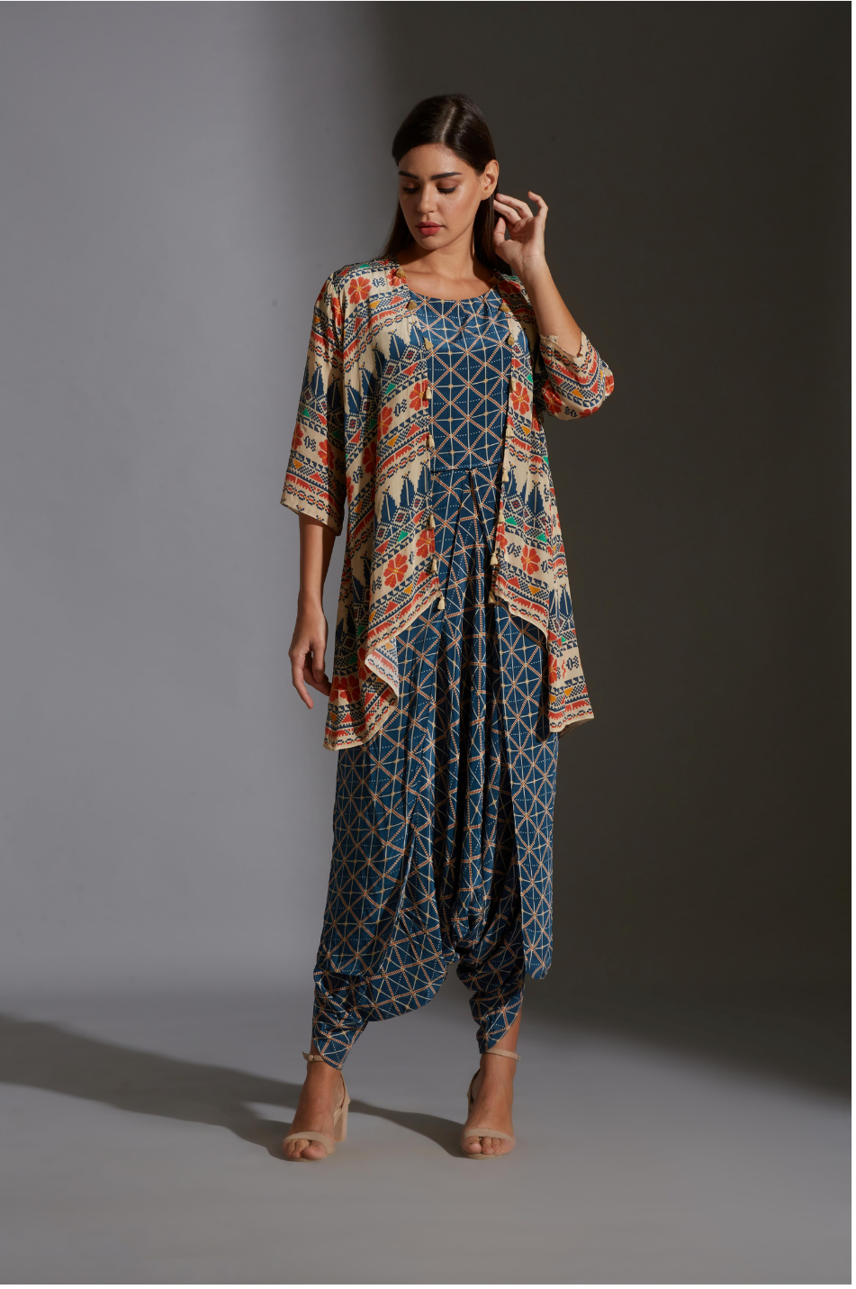 Image of DHOTI JUMPSUIT WITH SHORT JACKET. From savoirfashions.com