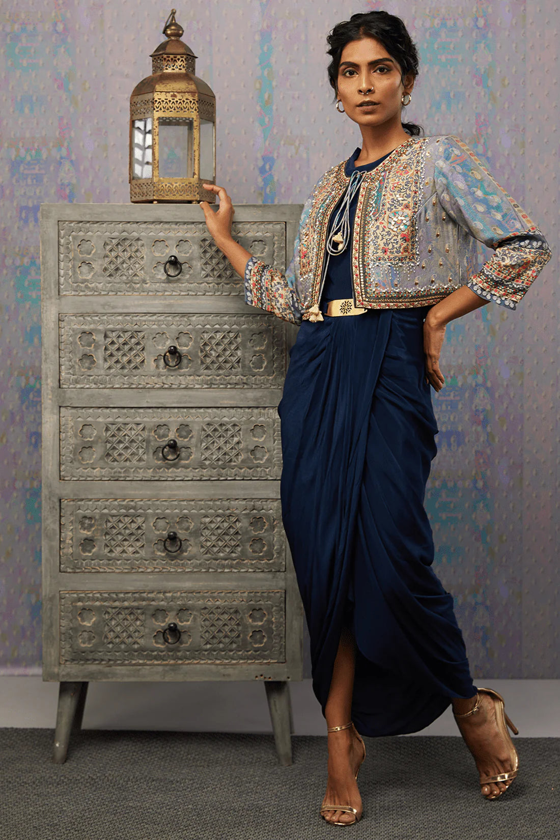 Image of This elegant IKAYA Embroidered Drape Dress with Jacket exudes sophistication from its intricate embroidery details, high-quality fabrication, and timeless silhouette. Crafted from a lightweight blend of silk and cotton, this piece feels luxurious and soft against the skin. The lace-up closure ensures a comfortable and flattering fit. Perfect for special occasions, this dress and jacket ensemble is sure to become a wardrobe staple.  From savoirfashions.com
