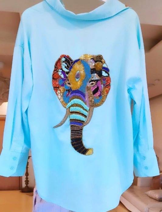 BLUE SHIRT WITH ELEPHANT AT THE BACK