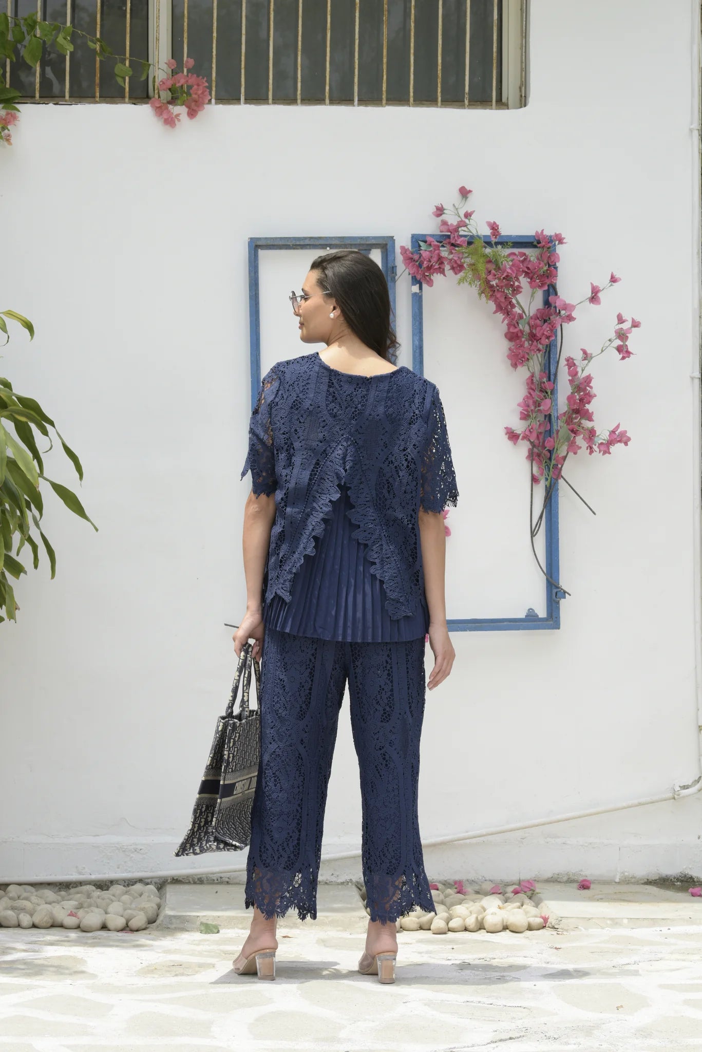 Image of Send subtle hints of elegance in the MYRA Mesh Cross Back Co-ord set. This two-piece set comes in a midnight blue color, and features a delicate mesh cross-back for a subtle hint of sophistication. Enjoy the perfect mix of style and comfort with MYRA. From savoirfashions.com